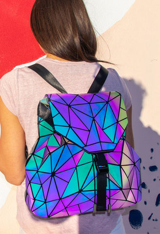 Holographic backpack with colour change in light